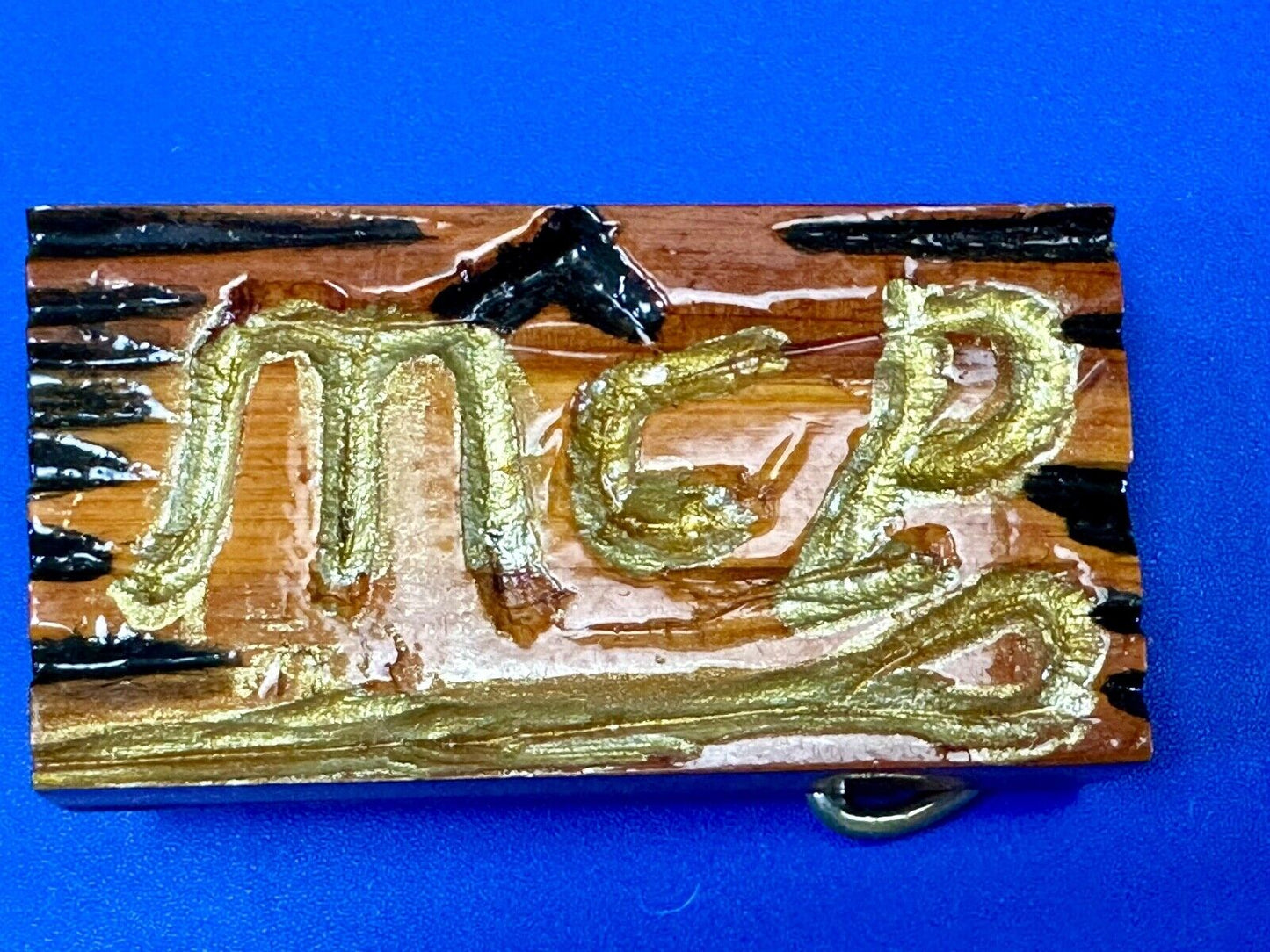 Artisan wood belt buckle with M & P engraved Initials