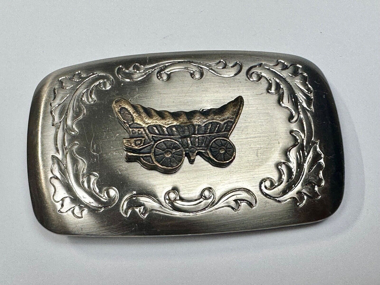 Vintage covered wagon two tone western mixed metal belt buckle