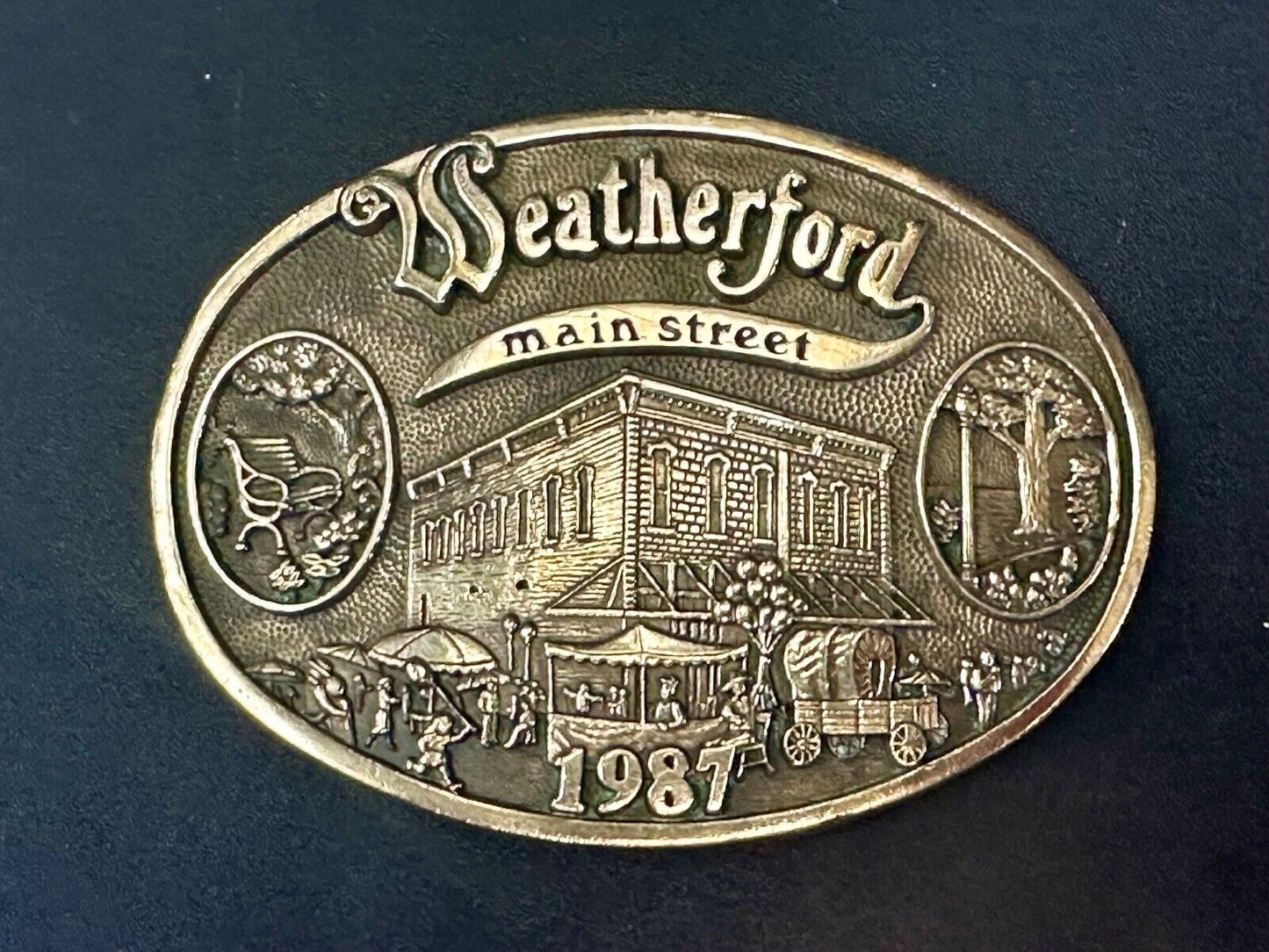 Texas Weatherford Main Street - vintage 1987 LIMITED ADM solid brass belt buckle