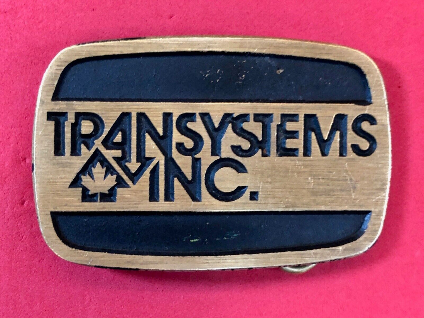 transystems inc Canada Promo belt buckle -a Construction engineering company