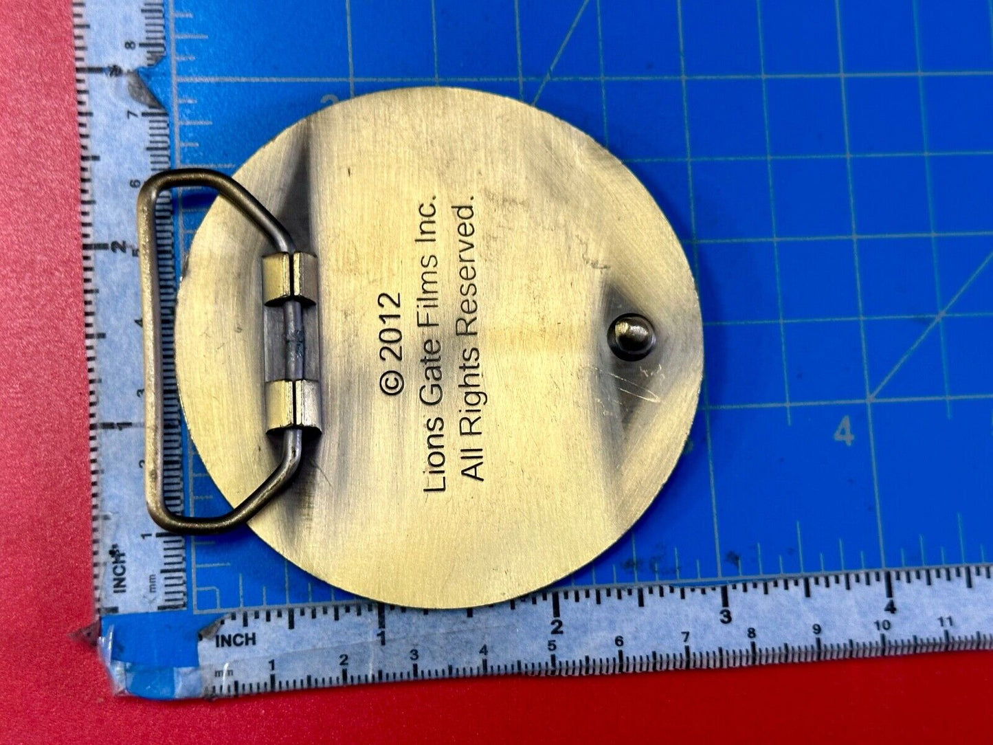 The Hunger Games, District 12 Tribute - Movie Book Emblem belt buckle