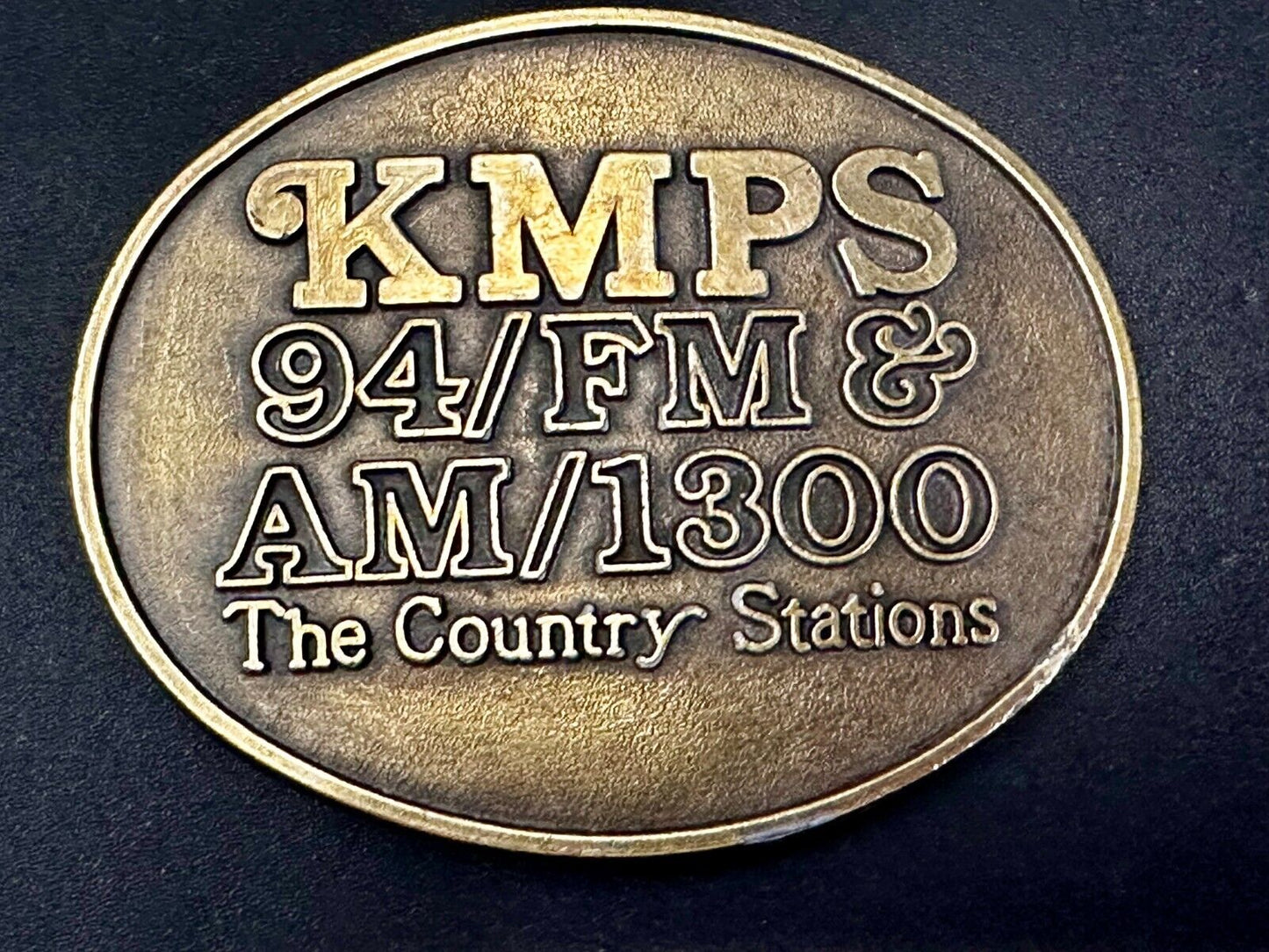 The Country Radio Station KMPS 94/FM & AM/1300 Advertisement Belt Buckle