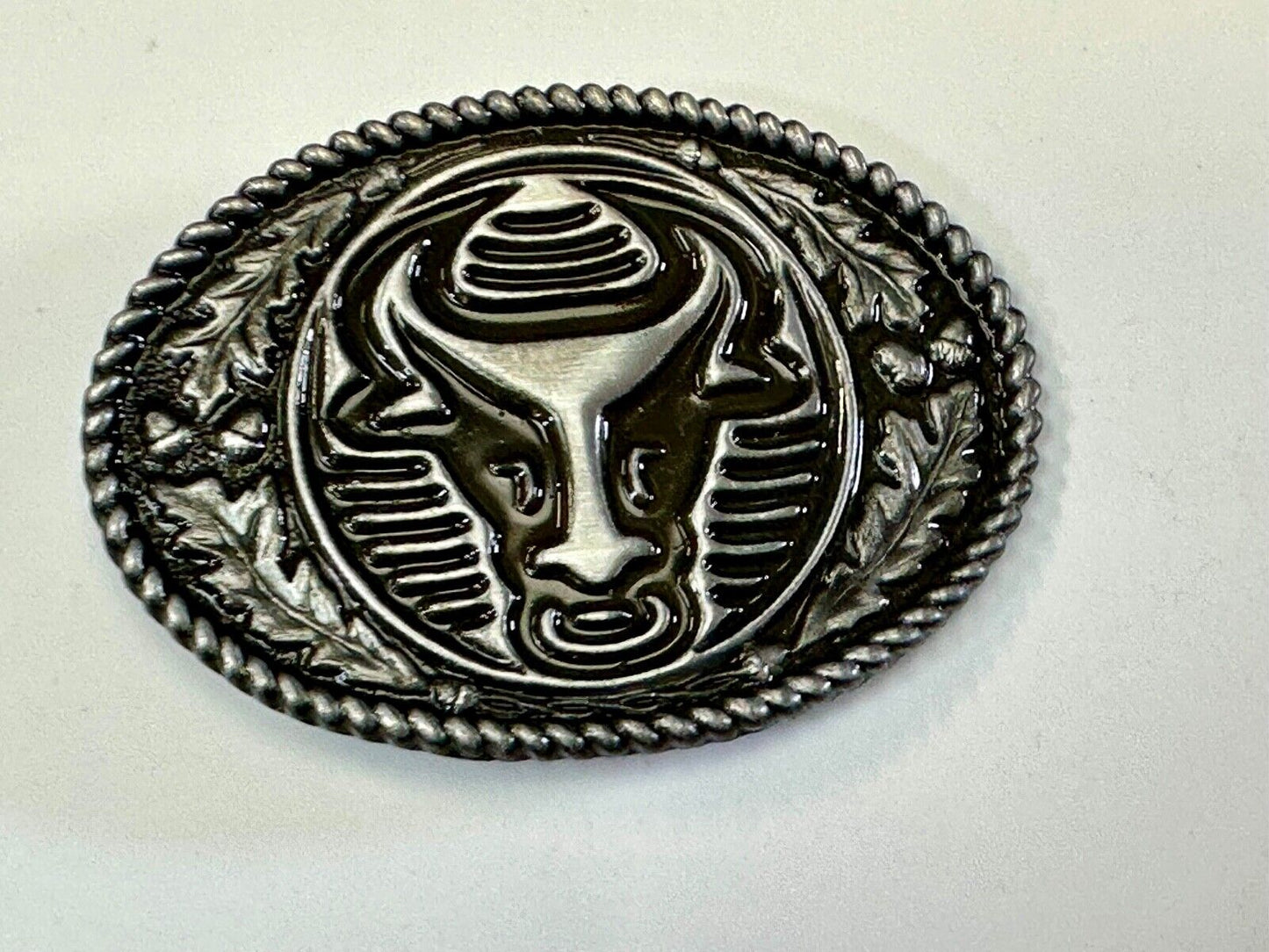 The Longhorn cow steer with nose ring Vintage rope boarder belt buckle