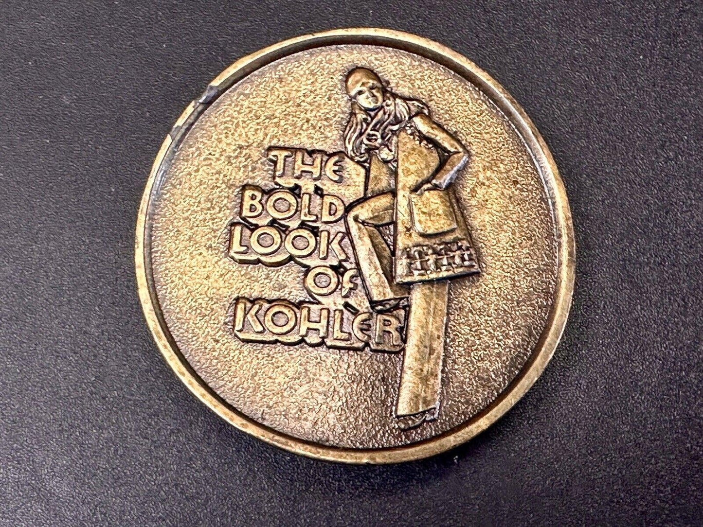 The Bold Look of Kohler Vintage 1977 Lewis round Limited Edition belt buckle