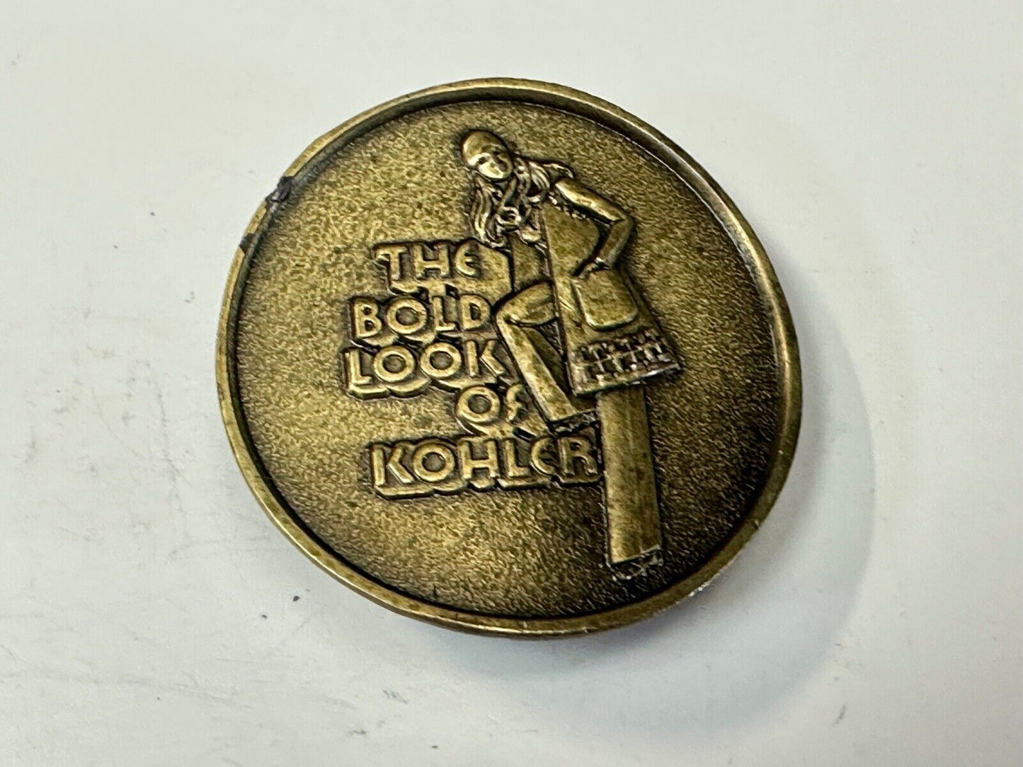 The Bold Look of Kohler Vintage 1977 Lewis round Limited Edition belt buckle