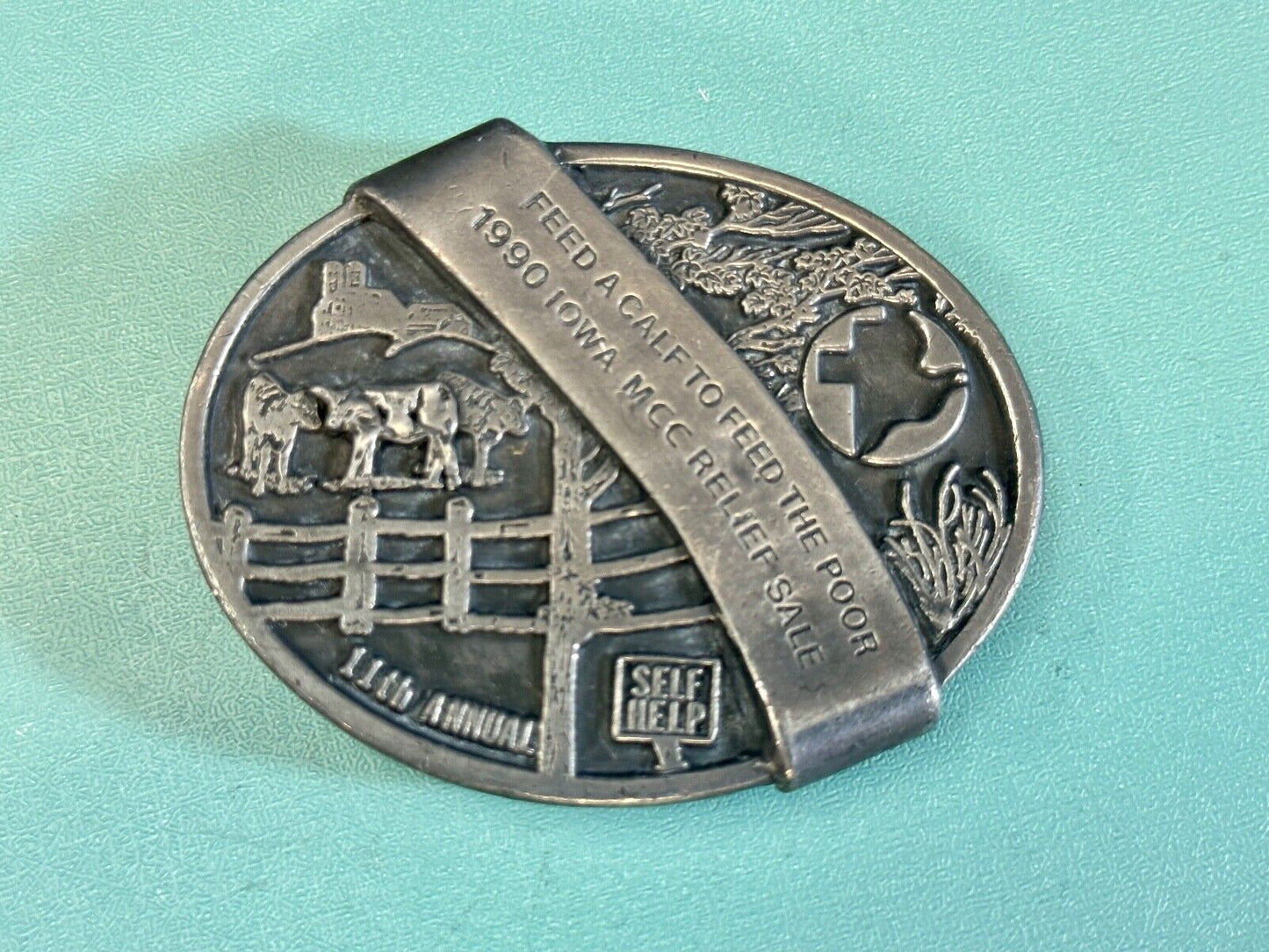 1990 Iowa MCC rebuff sale- Feed Calf to feed the poor belt buckle