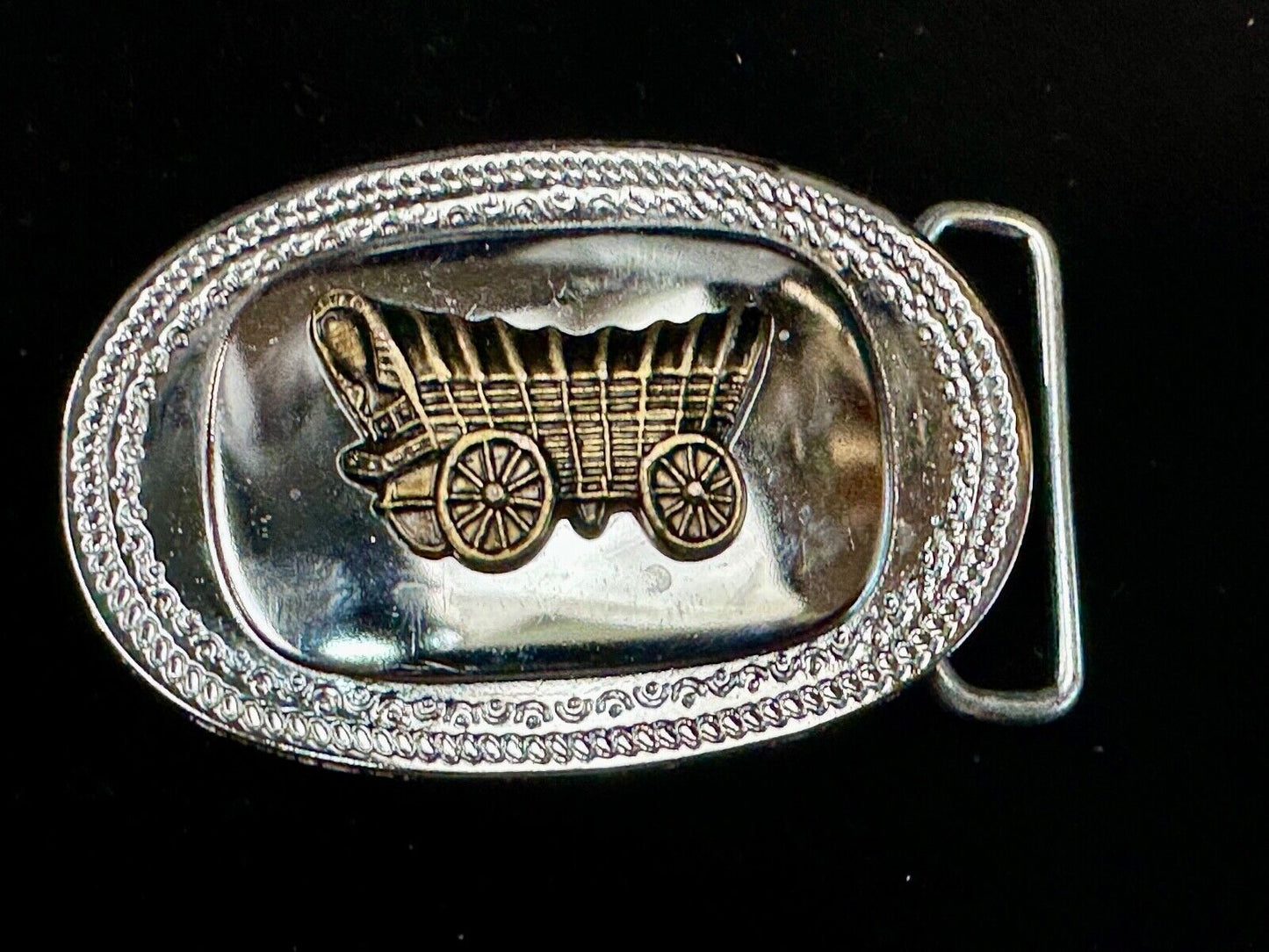 Vintage Covered Wagon on reflective oval two tone western belt buckle