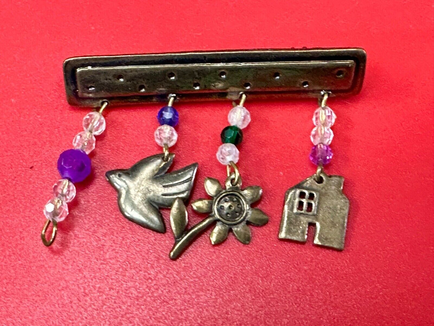 avon signed dangle brooch pin - Dove stunflower house - missing a charm