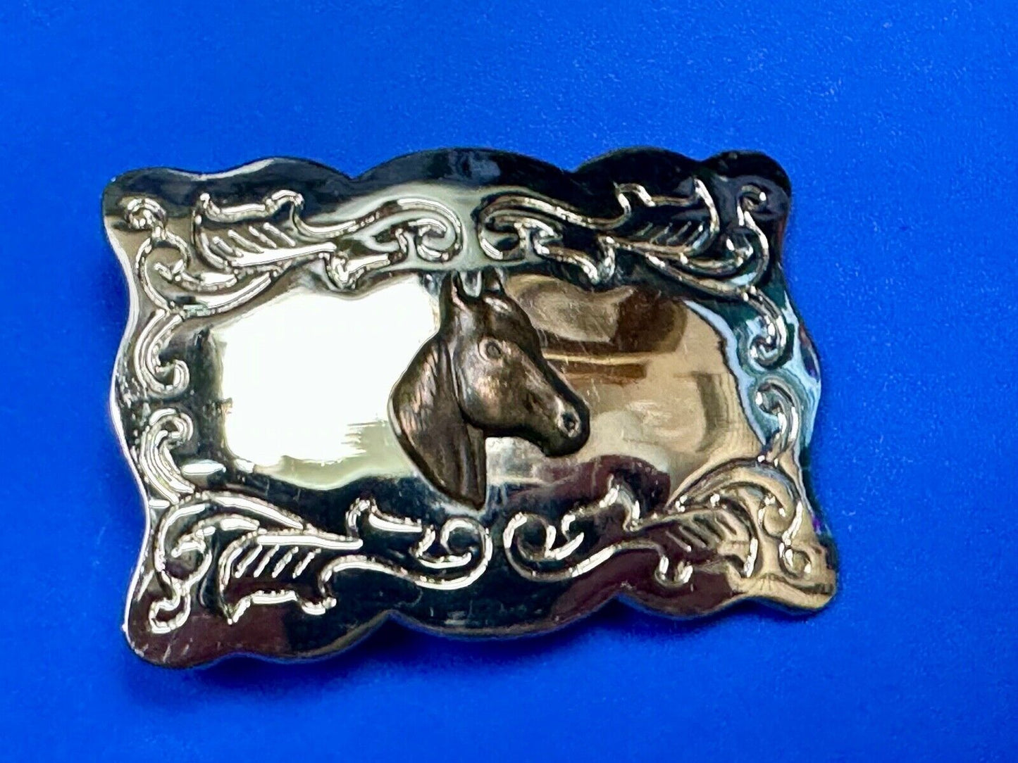 Vintage horse head centered on western rectangular two tone belt buckle