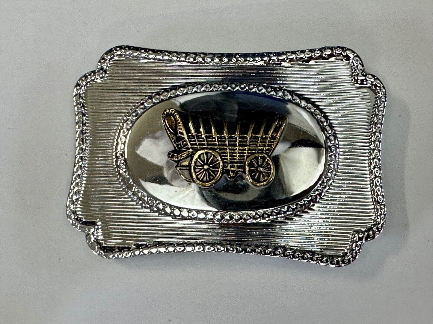 Vintage Covered Wagon - western two tone outlined belt buckle