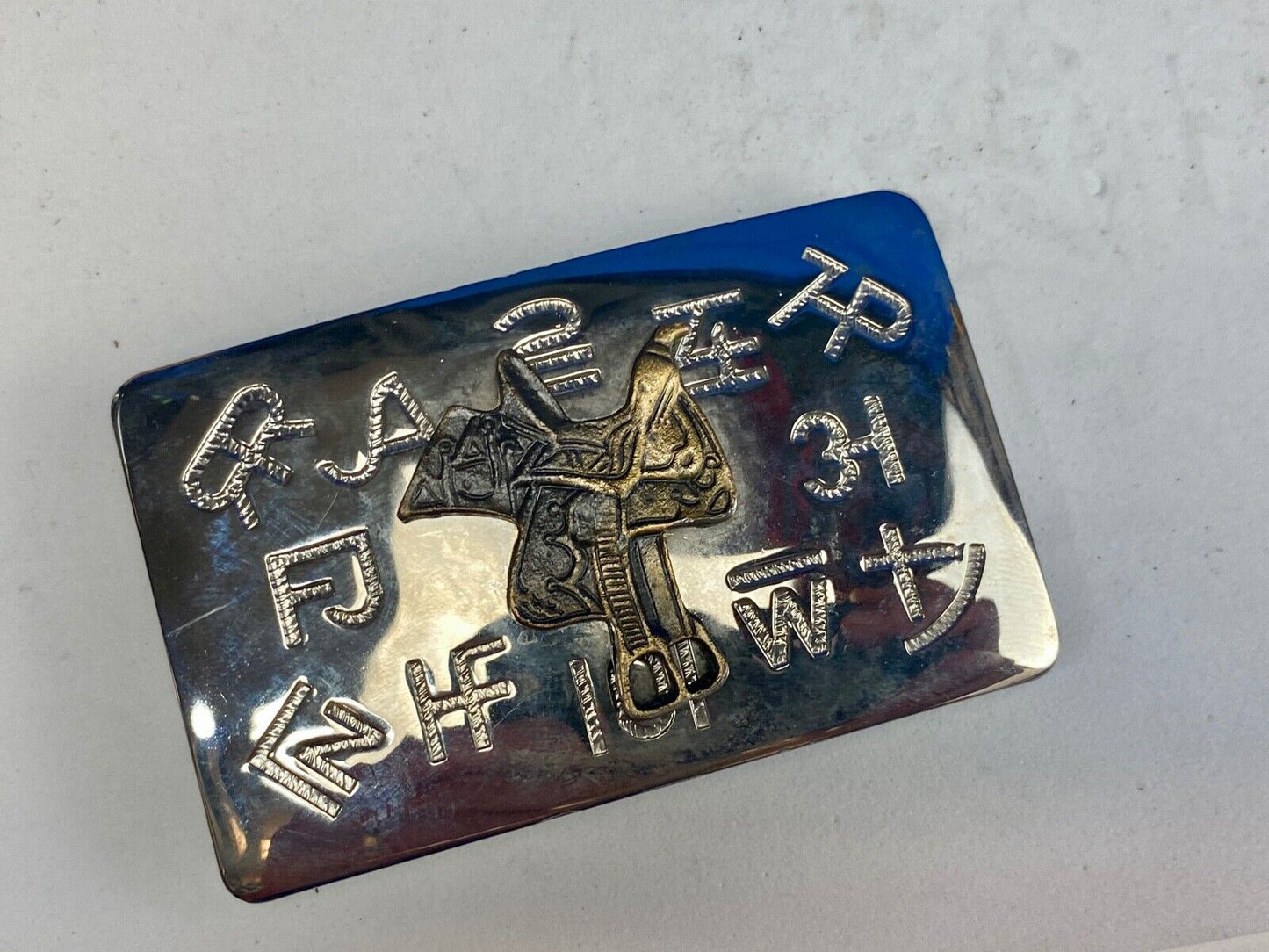 Vintage Chambers western Saddle Belt Buckle with cattle branding symbols