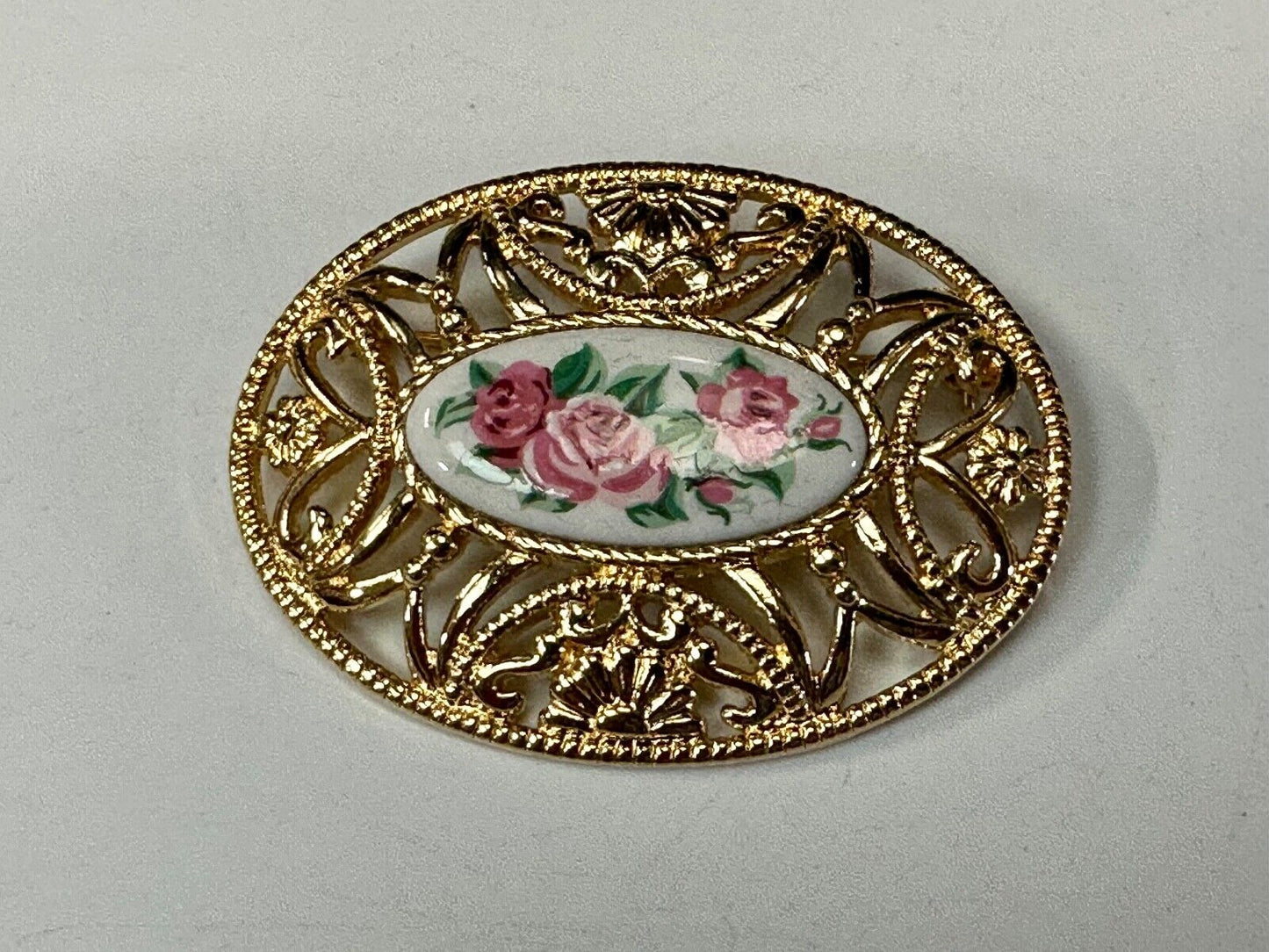 Avon signed gold tone see through surround Porcelain flower theme brooch pin