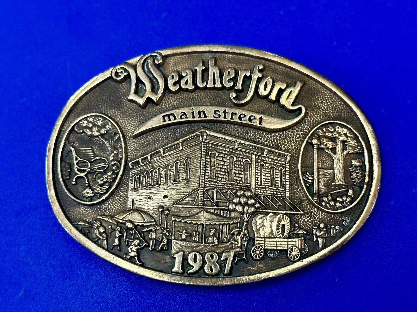 Texas Weatherford Main Street - vintage 1987 LIMITED ADM solid brass belt buckle