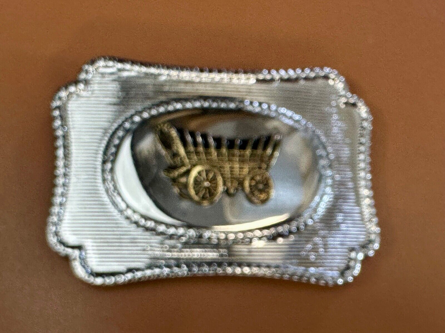 Vintage Covered Wagon - western two tone outlined belt buckle