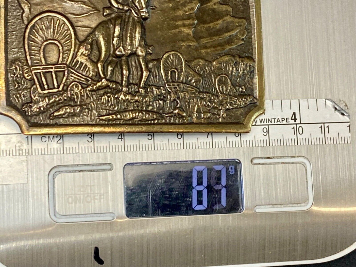 Tall in the Saddle - Covered Wagon Cowboy brass tone western belt buckle