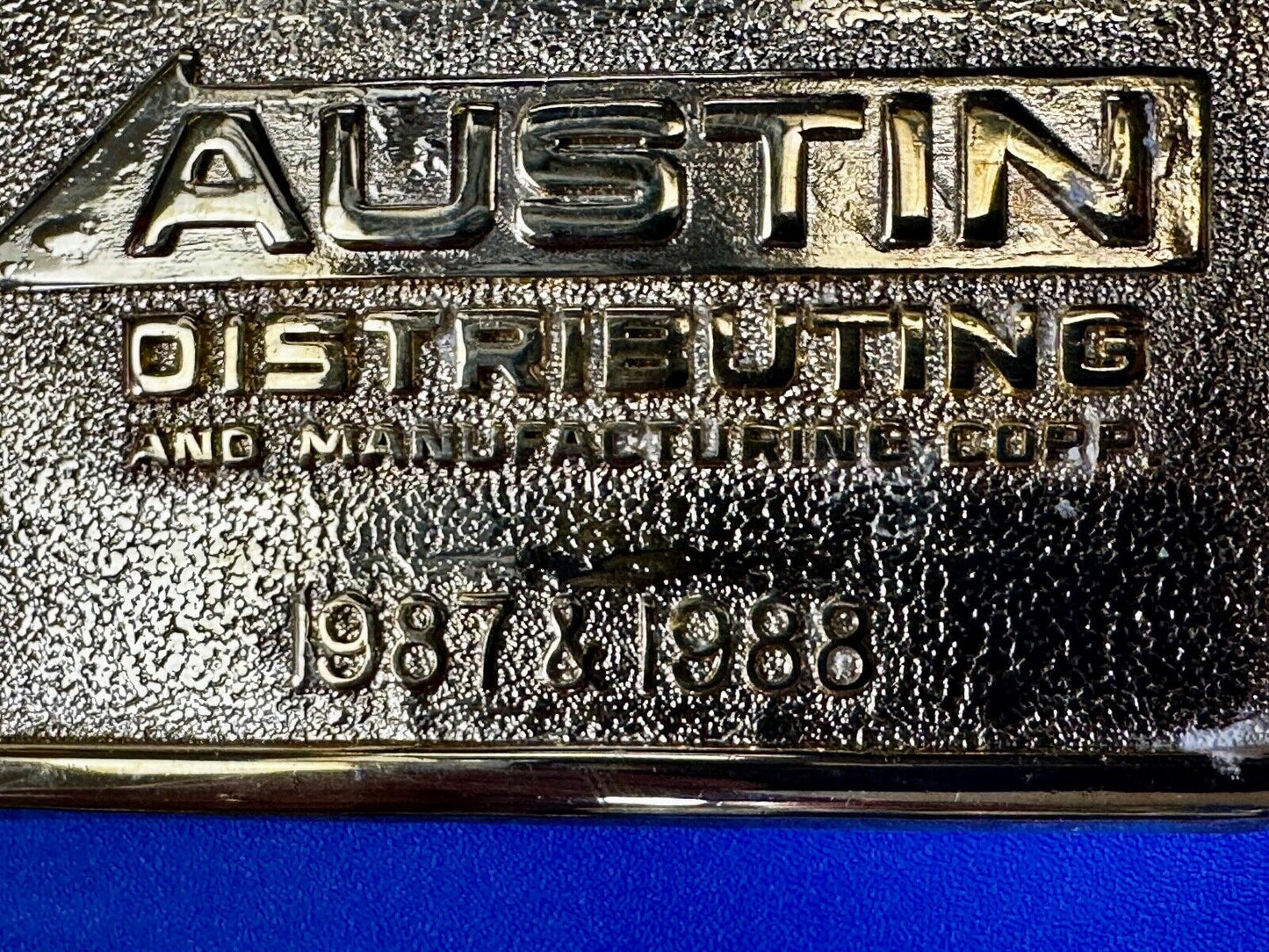 Austin Texas Distributing and Manufacturing 1987 - 1988 Gold Tone Belt Buckle