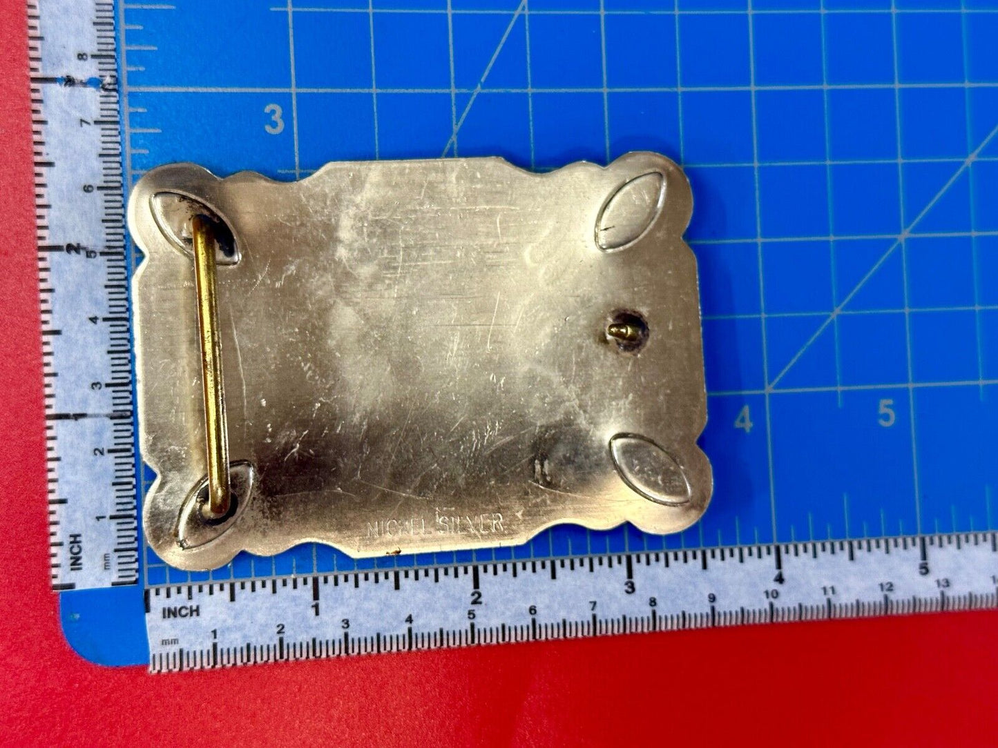 The Longhorn cow steer western nickel silver belt buckle with turquoise accents