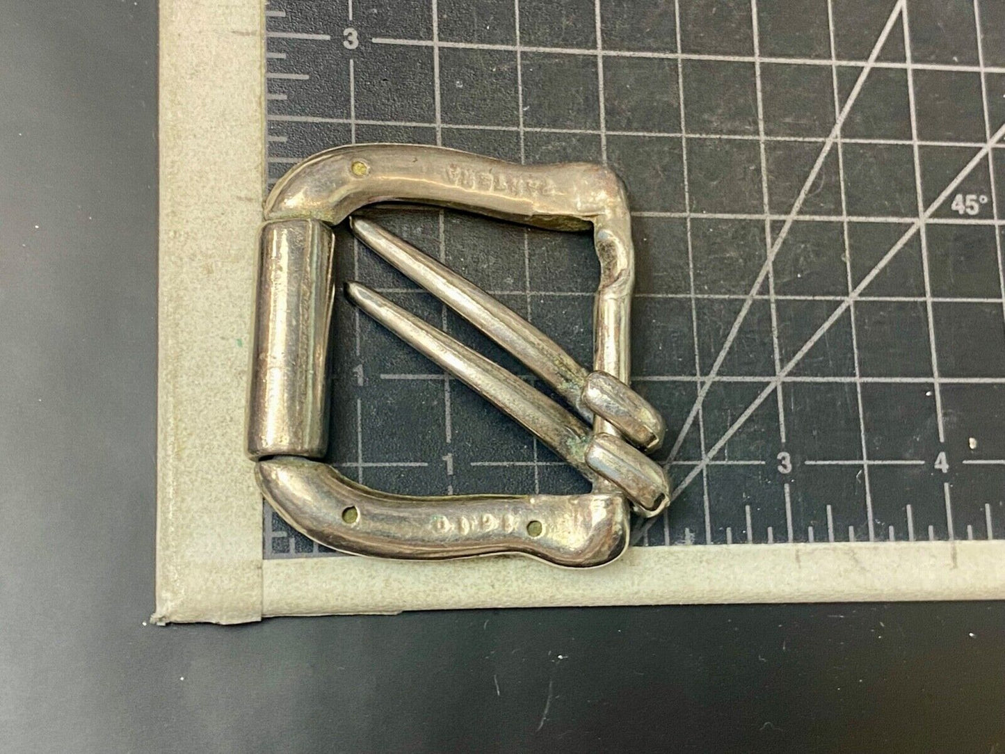 Vintage dual arm silver toned belt buckle stamped pantera 1610