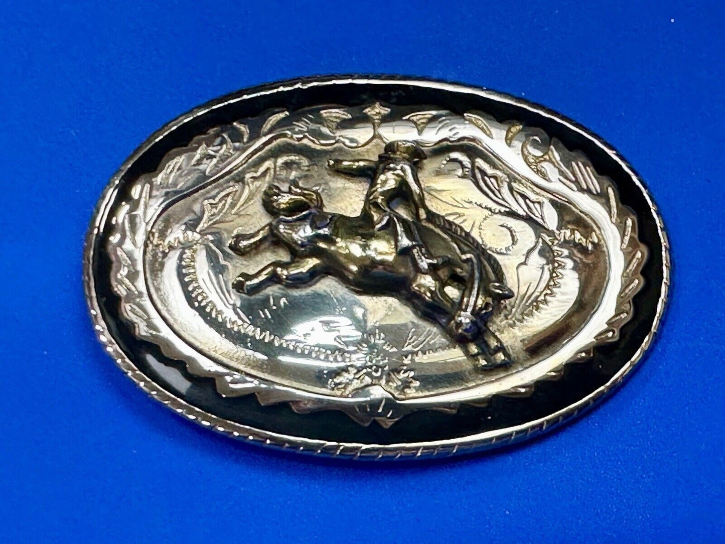Beautiful Cowboy Saddle Bronc western black silver gold color belt buckle