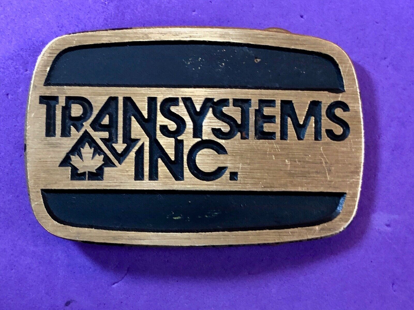 transystems inc Canada Promo belt buckle -a Construction engineering company