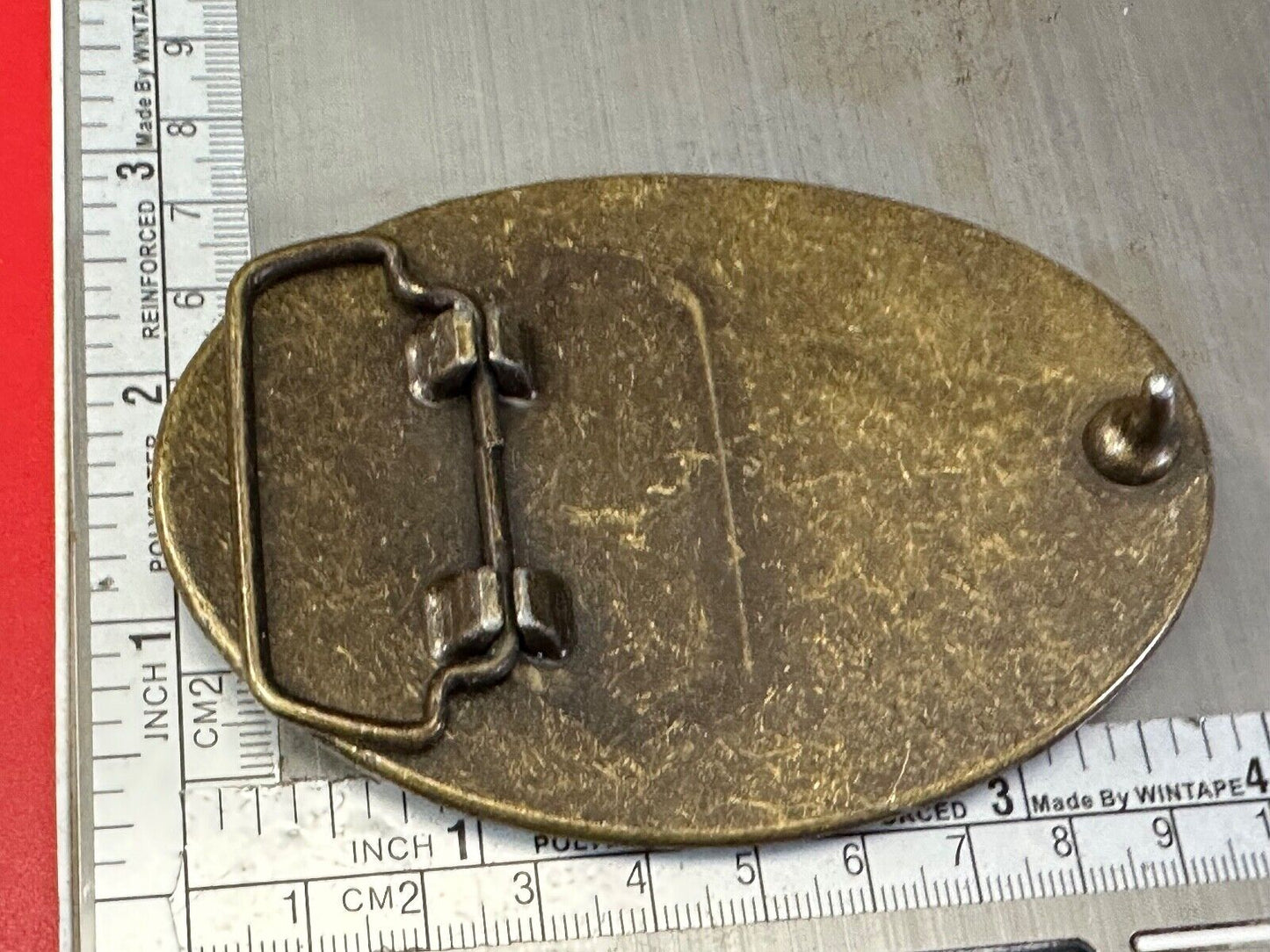 TFL. vintage western initials letters on leather belt buckle