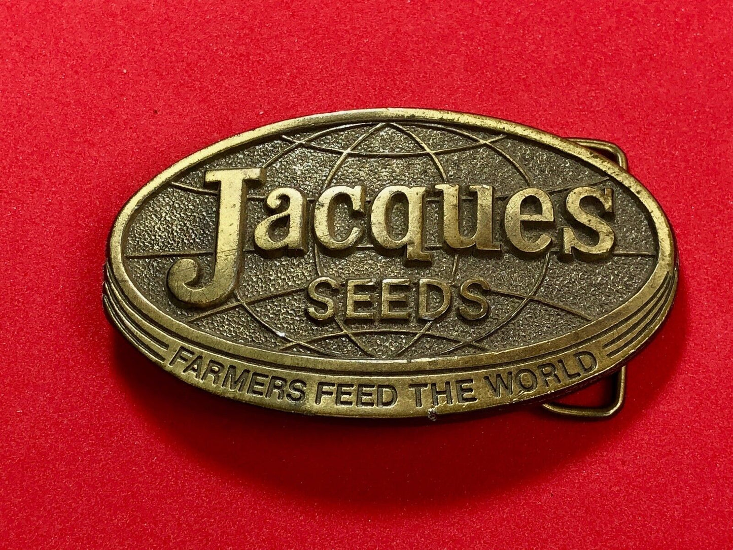 1970’s Jacques Seeds belt buckle farmers feed the world. Limited ED. Lewis