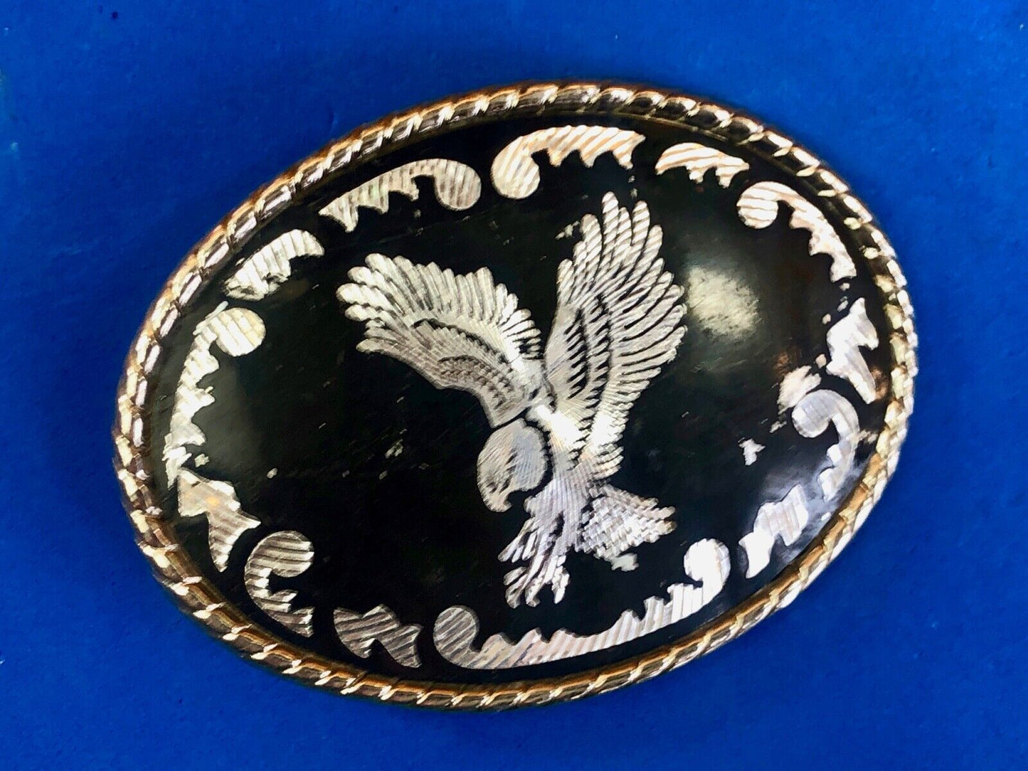 Black and silver color western belt buckle soaring eagle flying hunting diving w