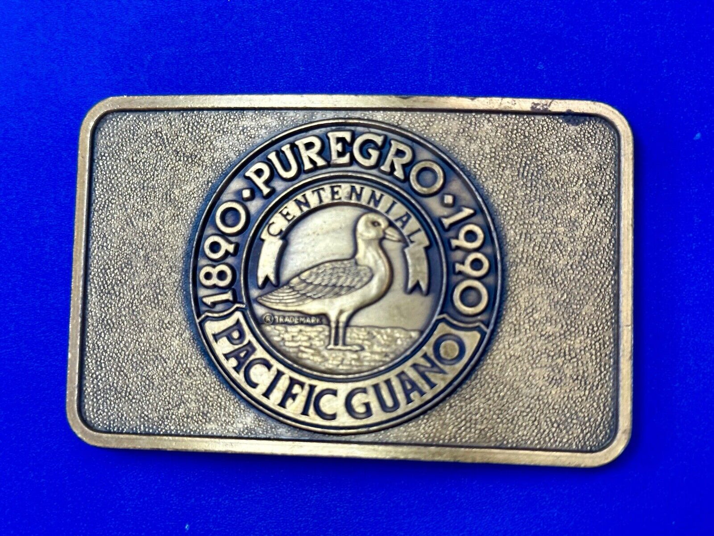 1990 Puregro Pacific Guano Centennial Celebration vintage belt buckle