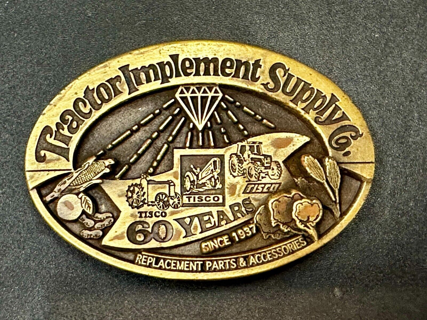 60 Years TISCO Tractor Implement Supply company NOS Belt Buckle by Speccast