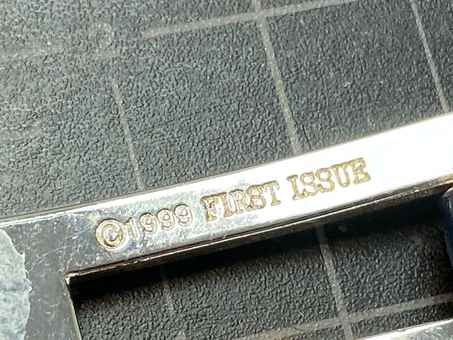 Vintage 1999 FIRST ISSUE dress silver tone belt buckle
