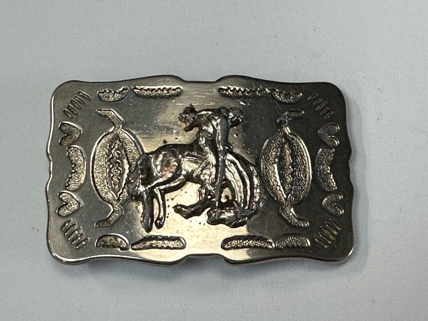 Vintage Cowboy Tipping Hat Head down Saddle Bronc western belt buckle