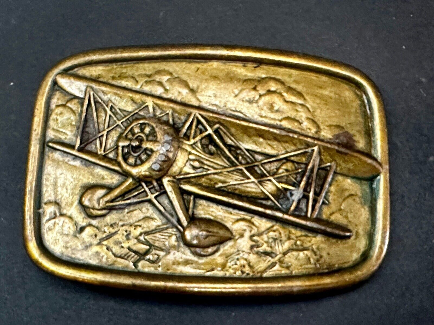 Airplane - Pilots Plane Bi_Wing Avon Vintage 1985 Flying Americana Belt Buckle