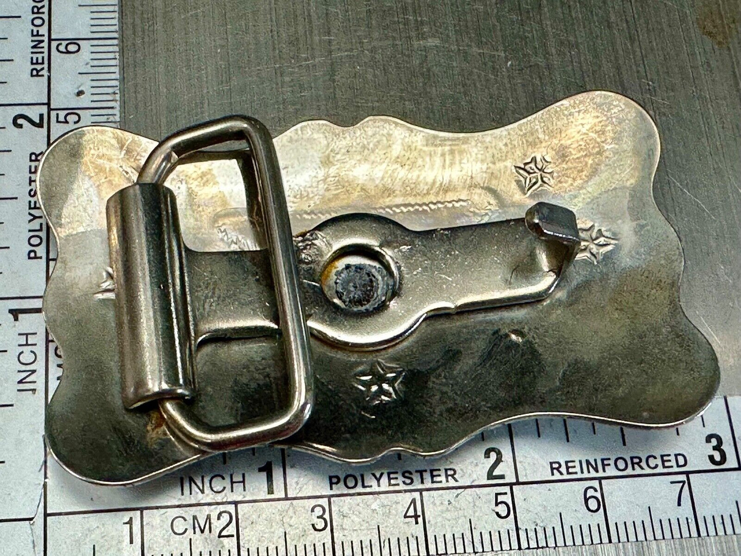 Vintage Cowboy Saddle Bronc western two tone belt buckle with star accents