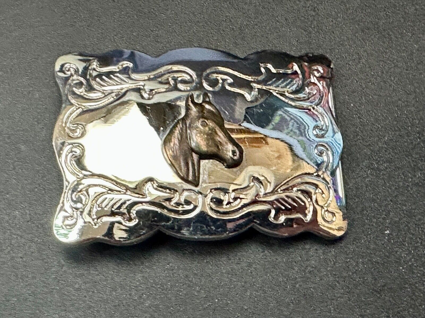 Vintage horse head centered on western rectangular two tone belt buckle