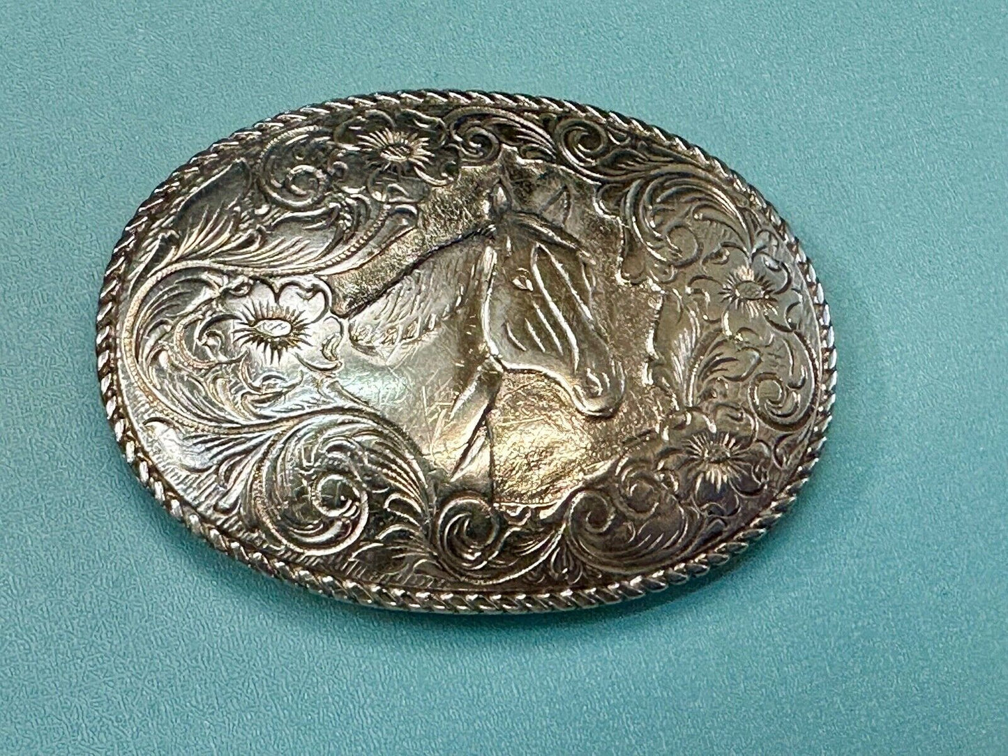 Beautiful large ornate HORSE BUST HEAD on engraved flower swirl belt buckle