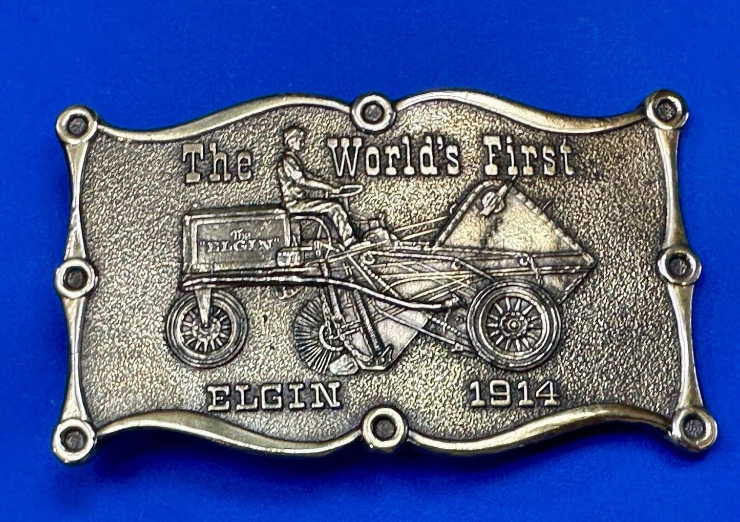 The Elgin, The worlds first tree sweeper commemorative belt buckle by Lewis