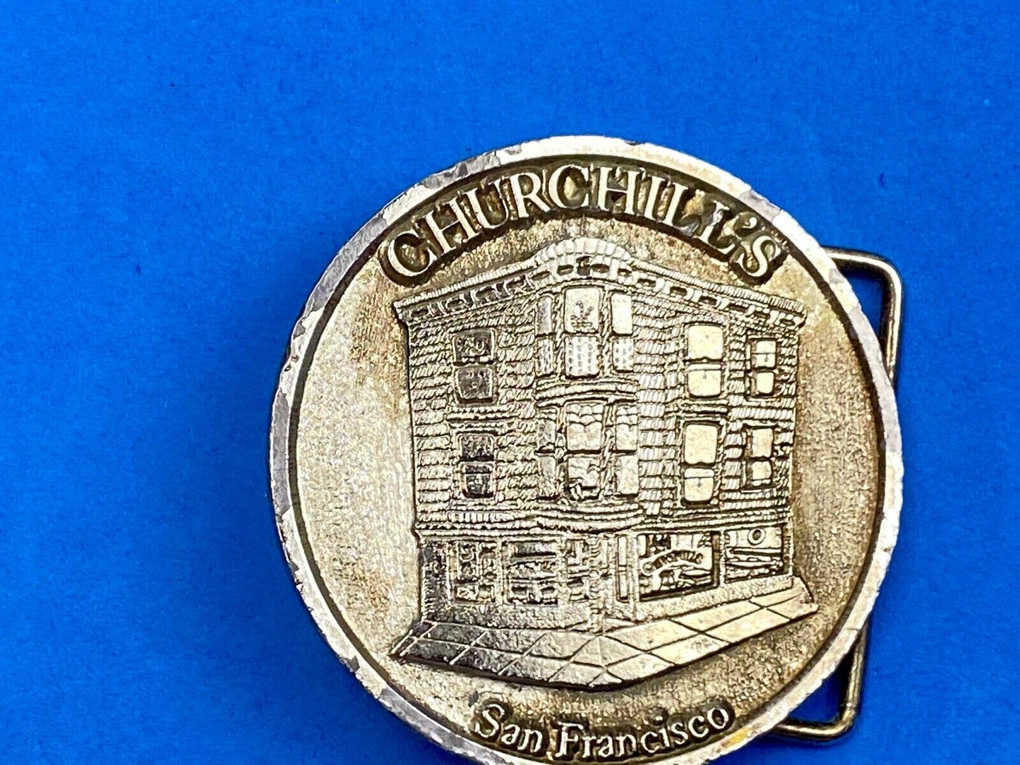 Vintage Churchill's San Francisco belt buckle by American pewter works the bar?