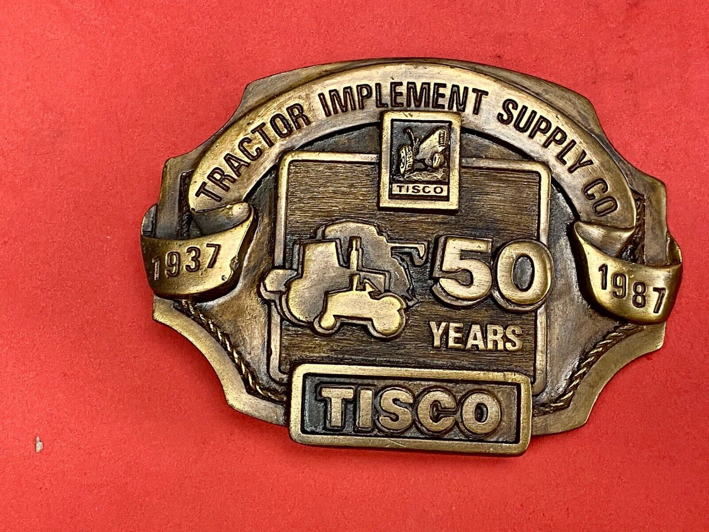 Vintage 1986 Tisco Tractor 50 years Anniversary Belt Buckle by Siskiyou