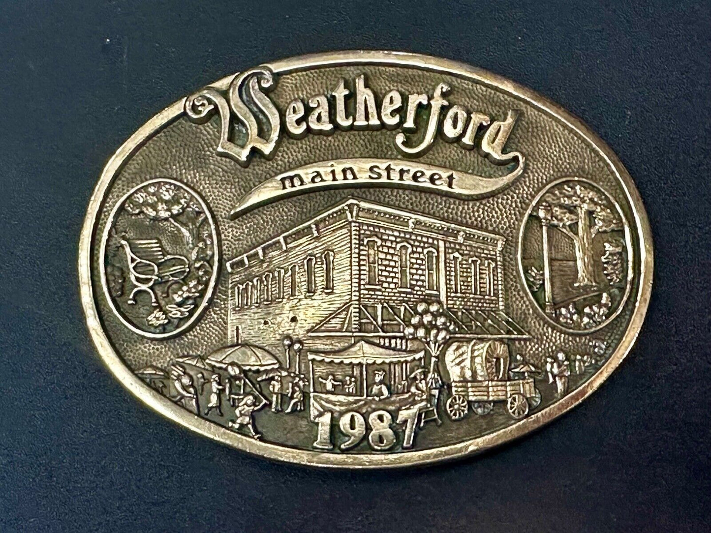 Texas Weatherford Main Street - vintage 1987 LIMITED ADM solid brass belt buckle
