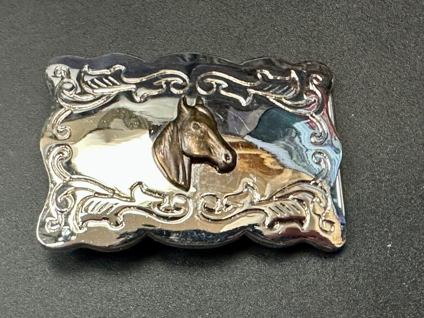 Vintage horse head centered on western rectangular two tone belt buckle