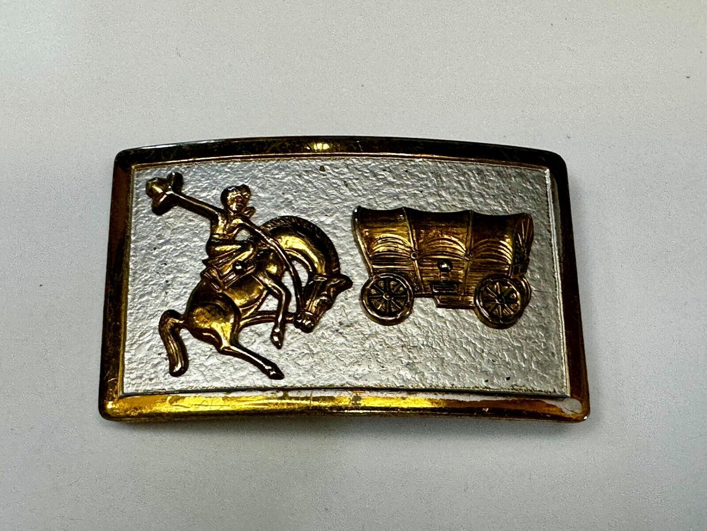 Vintage Cowboy Saddle Bronc western Covered wagon gold tone belt buckle
