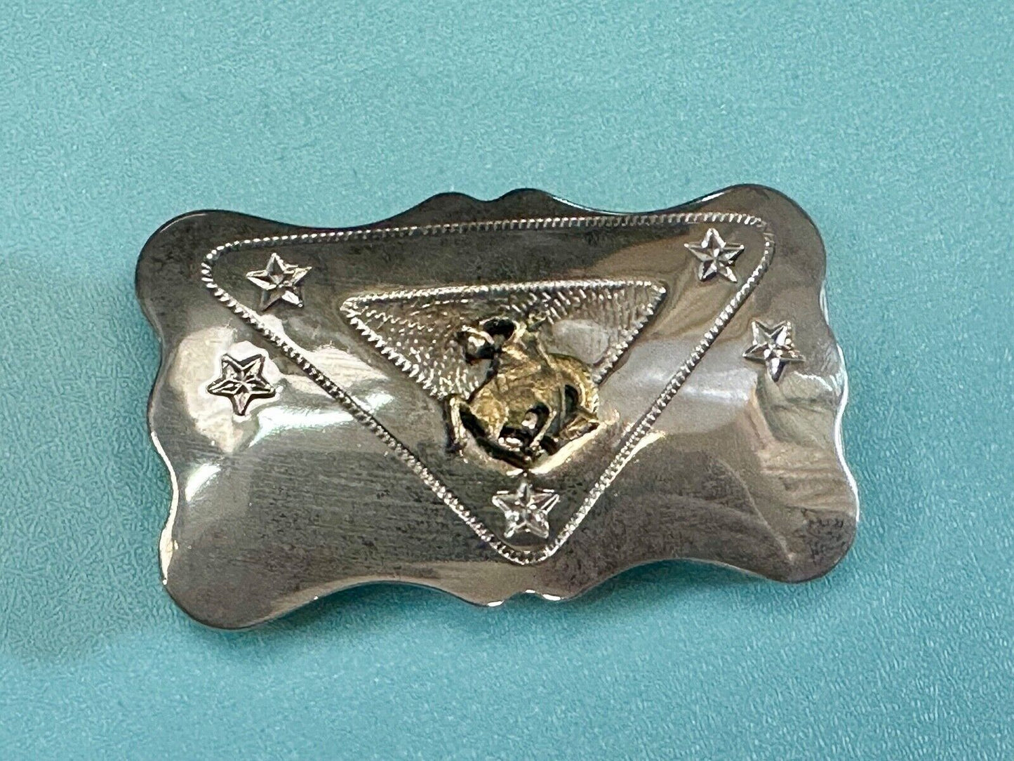 Vintage Cowboy Saddle Bronc western two tone belt buckle with star accents
