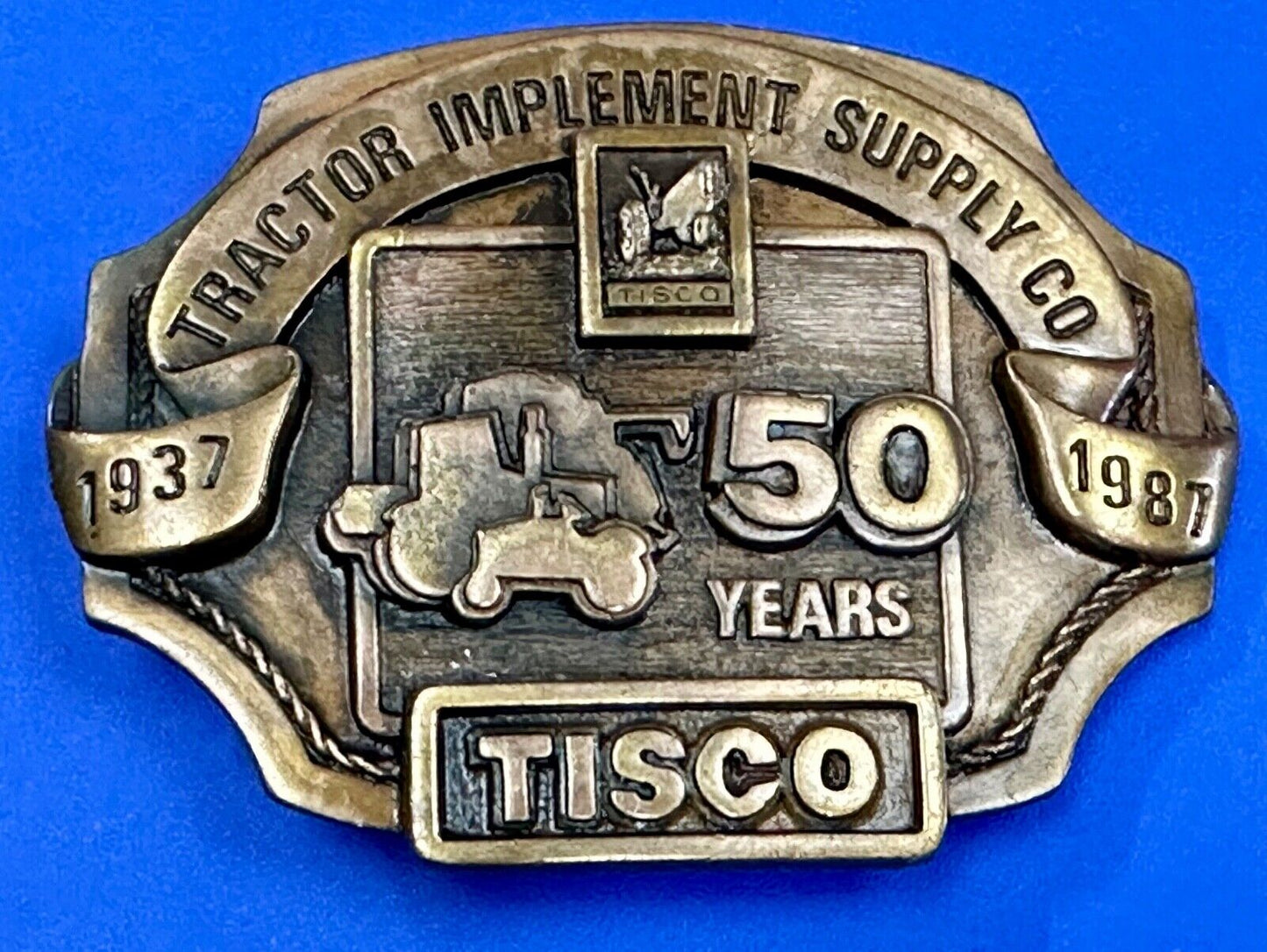 Tisco 50 year celebration Tractor farm supply company promo 1986 belt buckle
