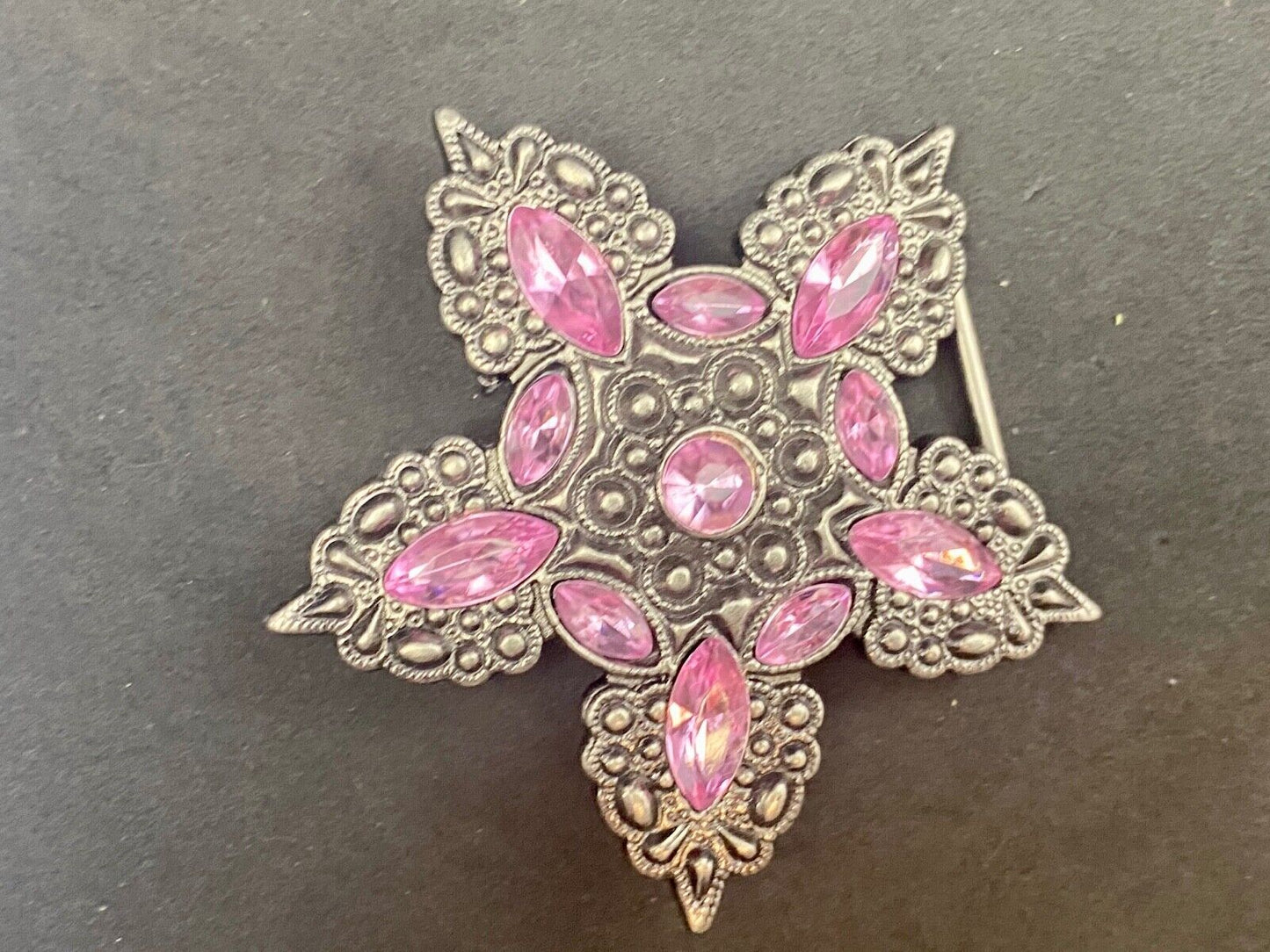 Beautiful figural star with pink accent rhinestones