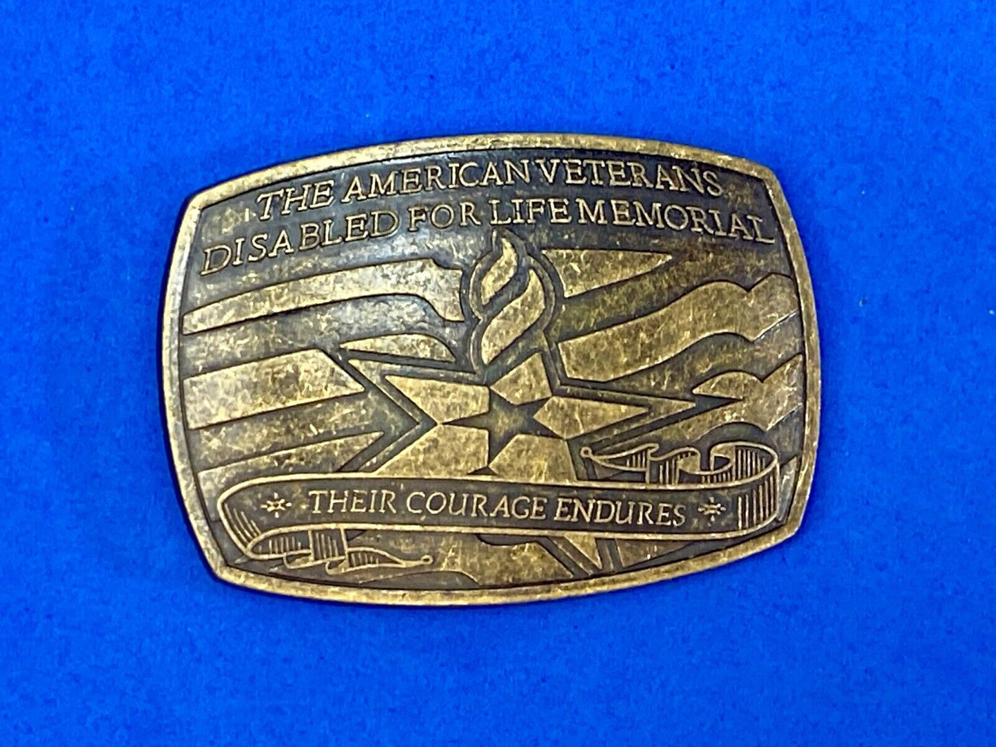 The American Disable Veteran Memorial Belt Buckle Their Courage Endures.