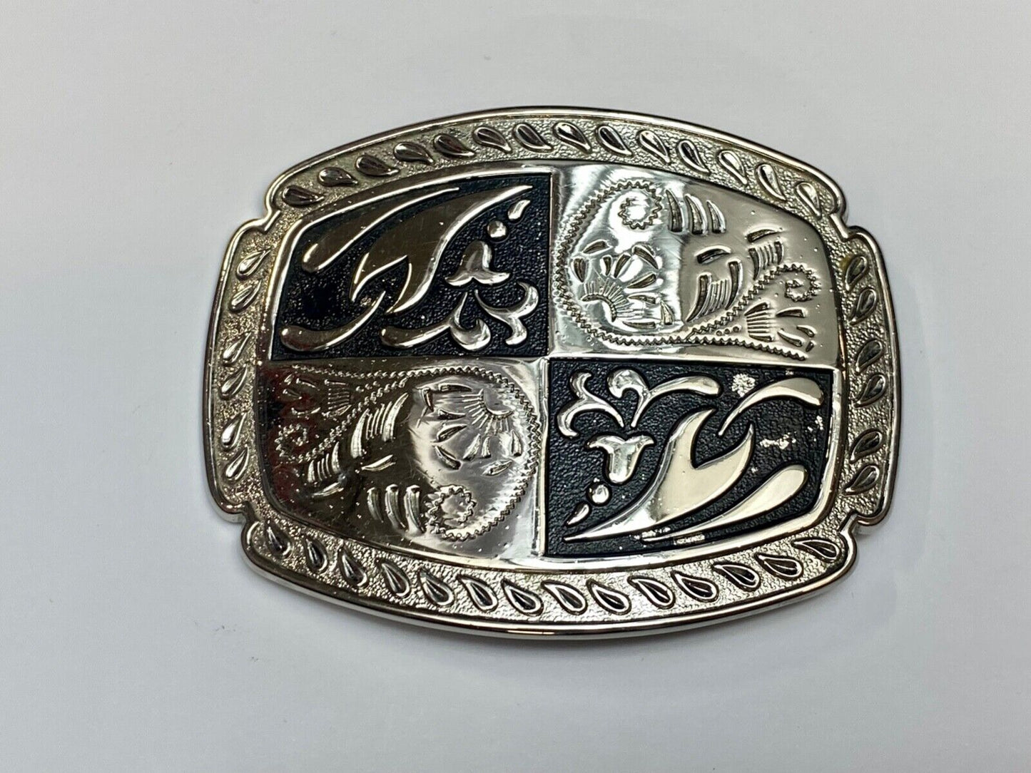 black and silver color western flower swirl outlined cowboy's belt buckle