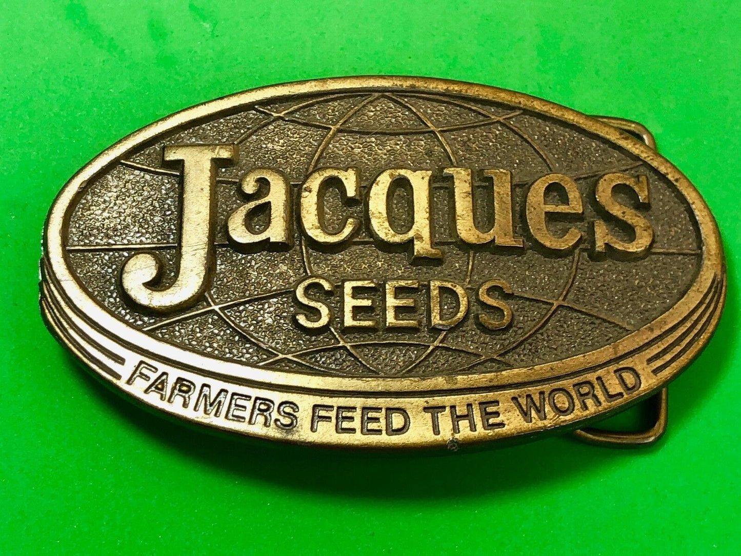 1970’s Jacques Seeds belt buckle farmers feed the world. Limited ED. Lewis