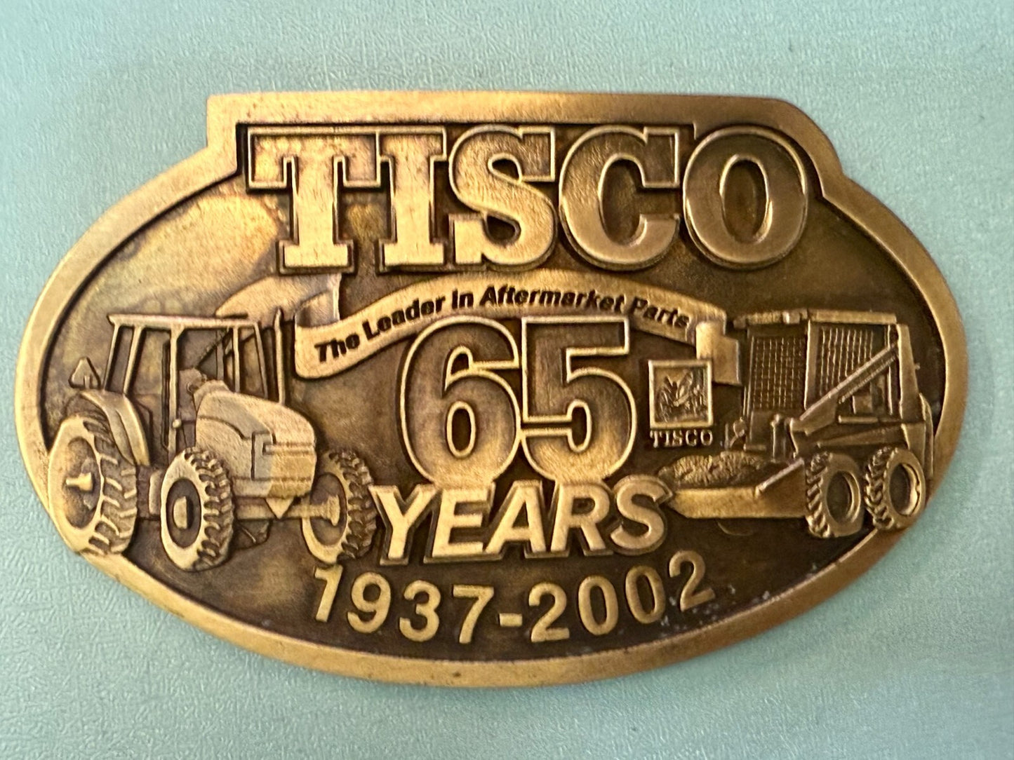 TISCO The Leader in Aftermarket Parts 65 Years 1937-2002 SPEC-CAST Belt Buckle