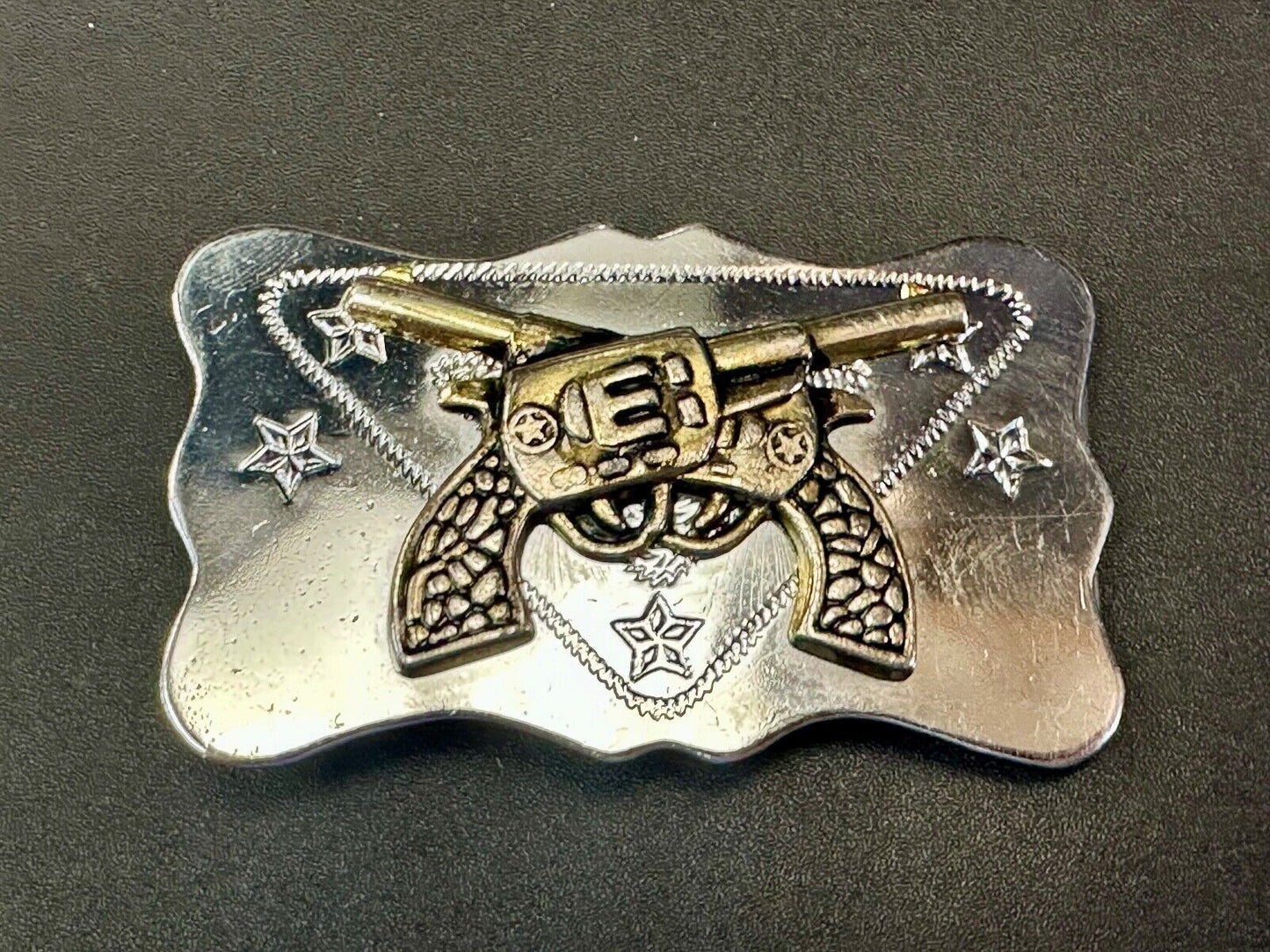 Vintage Cowboys Six Shooter gun's crossed western two tone belt buckle