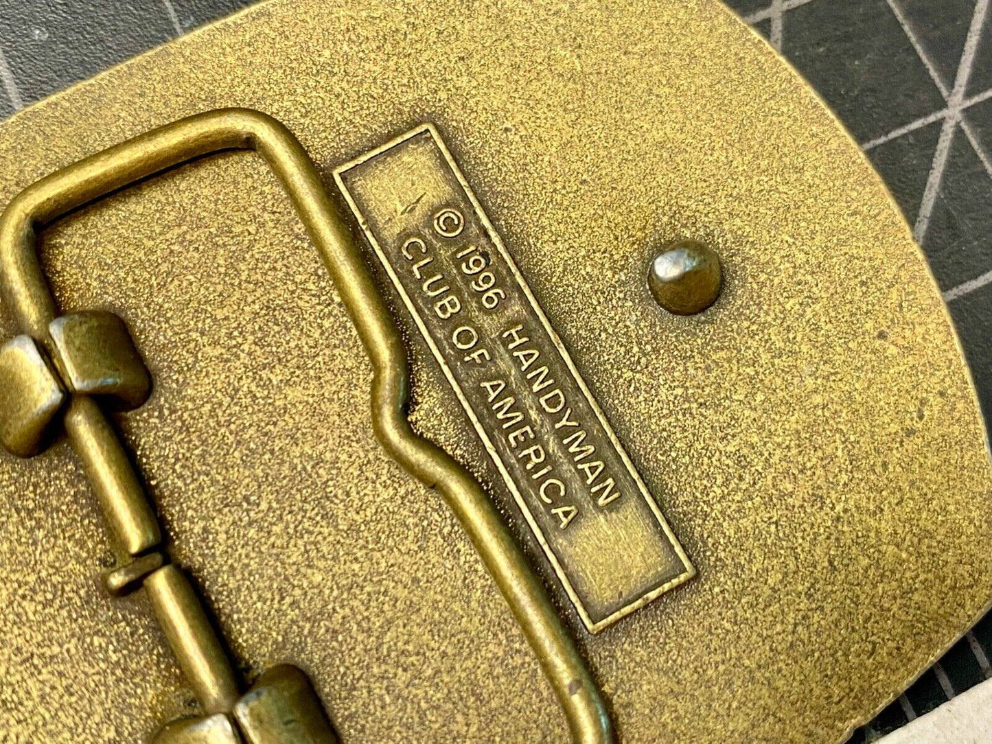 vintage handyman club of America Hammer Ruler- life member belt buckle